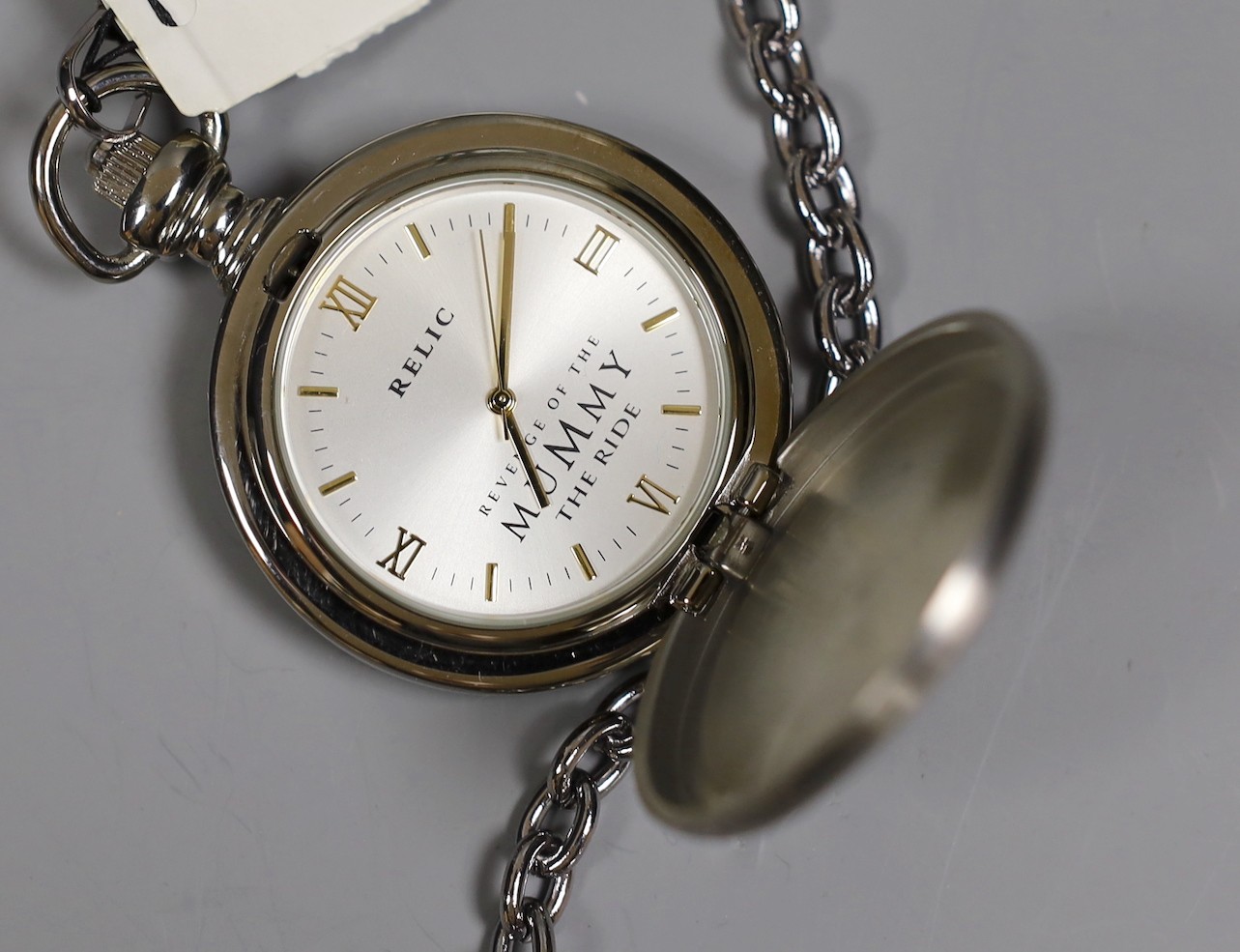 Walt Disney World - gentleman's wristwatch, one Walt Disney pocket watch and one Universal Studio's pocket watch given as gift of opening day of Revenge of the Mummy ride